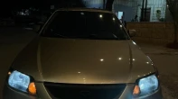 مازدا | MAZDA 323 2004