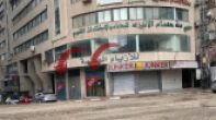 محلات على الشارع بجانب الستي مول